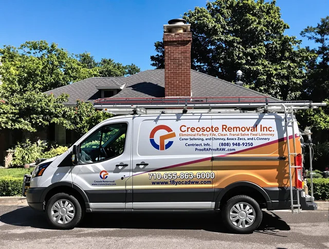 Garfield Heights Chimney Sweep technician removing creosote safely in Garfield Heights, OH